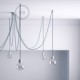 Soporte con enganche de techo transparente para cable eléctrico textil con tornillo de fijación.